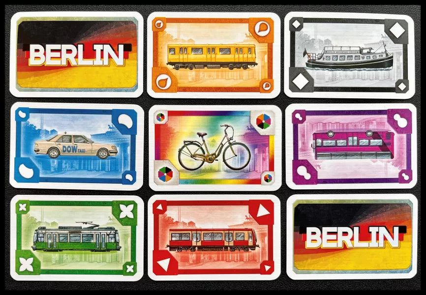 ticket to ride berlin, cards backside and orange, white, blue, wild, pink, green and red lines