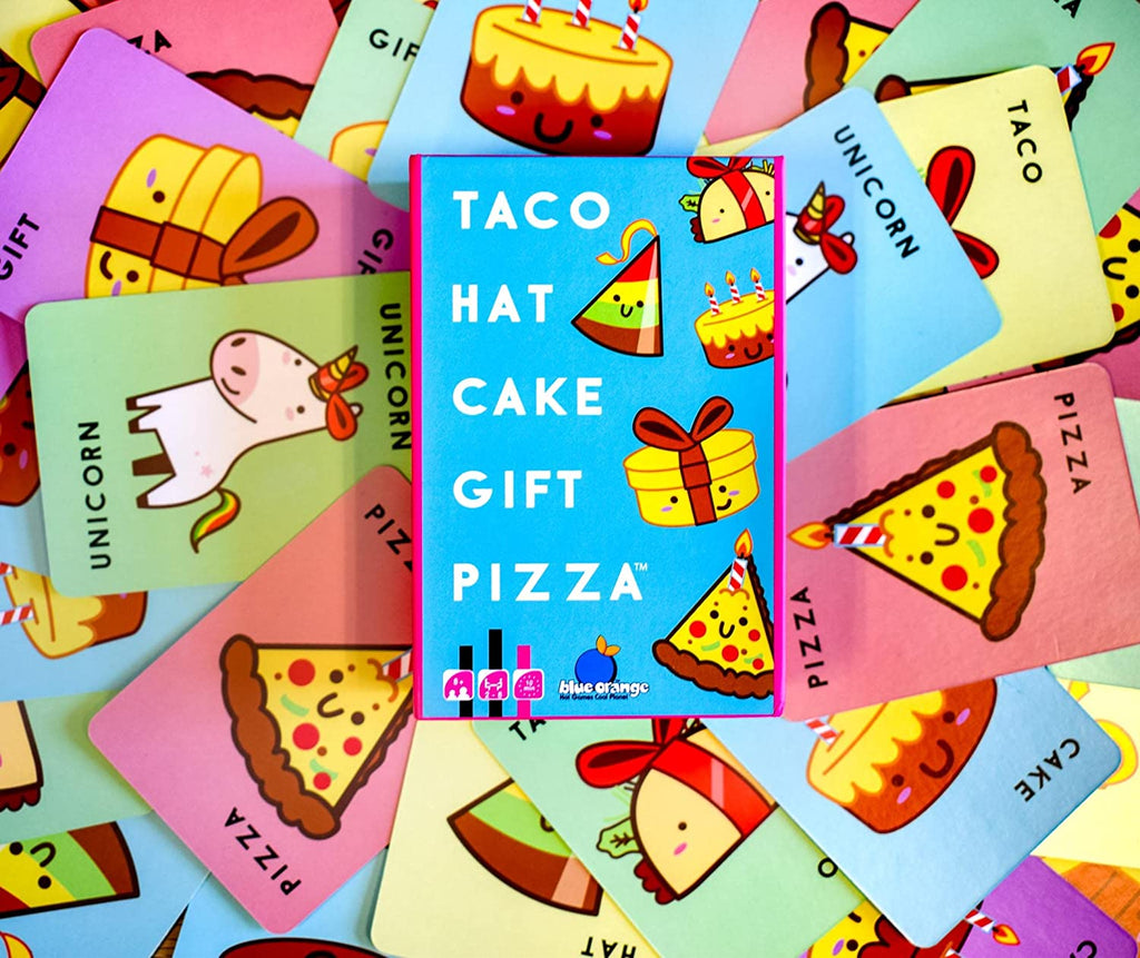Blue Orange Games Taco Hat Cake Gift Pizza card game beautifully displayed on top of playing cards