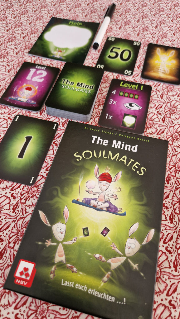 the mind soulmates game components on a table