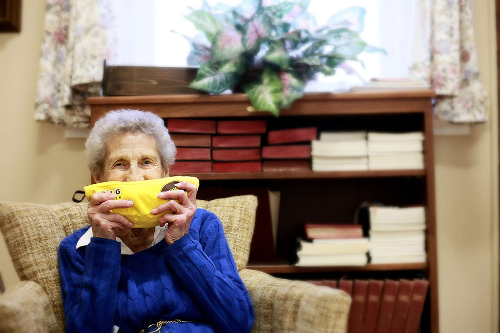 Grandmother holding a Big Letter Bananagram board game