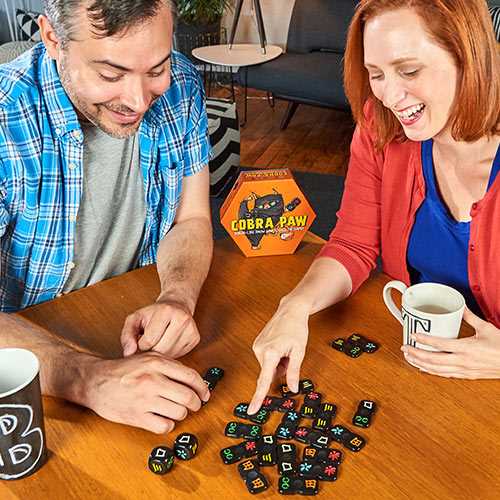 Bananagrams Cobra Paw dice game play by husband and wife