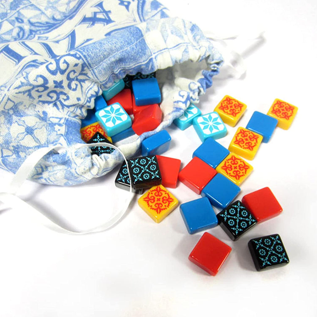 azul board game colorful tiles and a blue bag