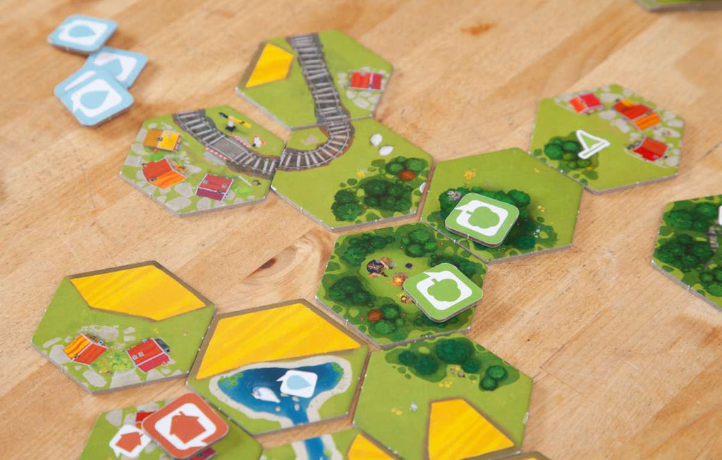 Pegasus Spiele Dorfromantik The Board game tile components of forest villages railroads and rivers with task markers
