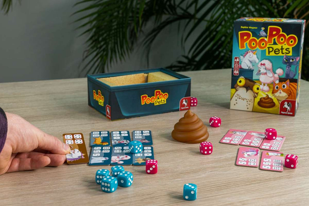 Pegasus Spiele Poo Poo Pets dice game contents with poo in the middle
