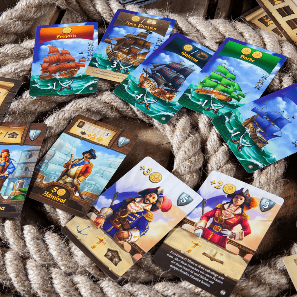 Pegasus Spiele Port Royal Big Box cards shot with character cards and ships