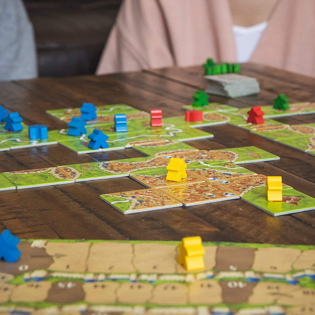close up shot of double date playing carcassonne