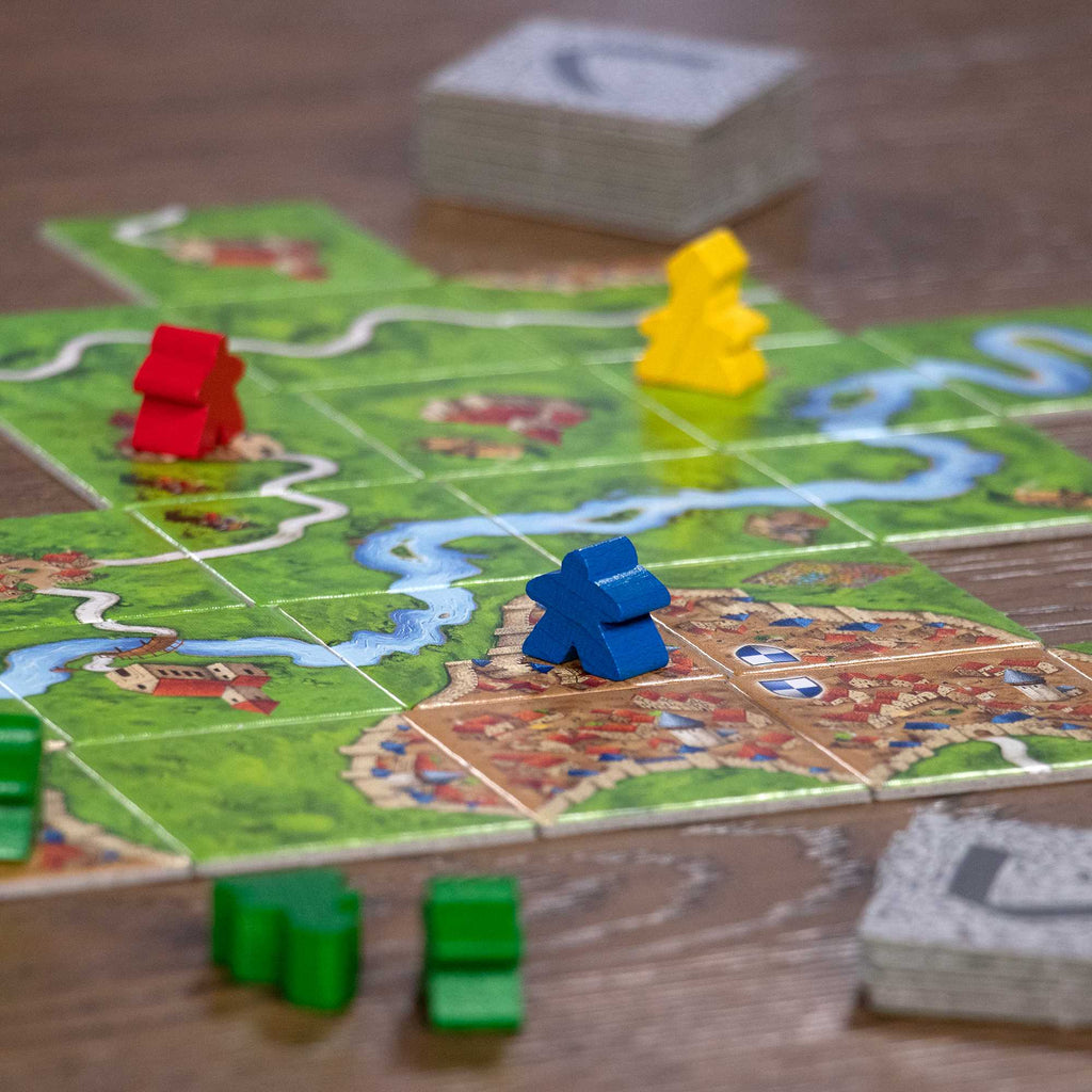 early game during a 4 player gameplay of a Carcassonne board game