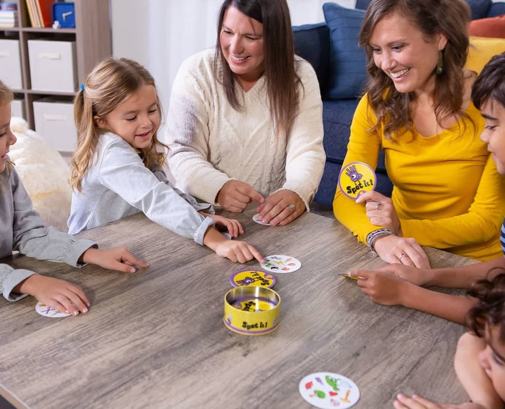 dobble card game moms and kids playing